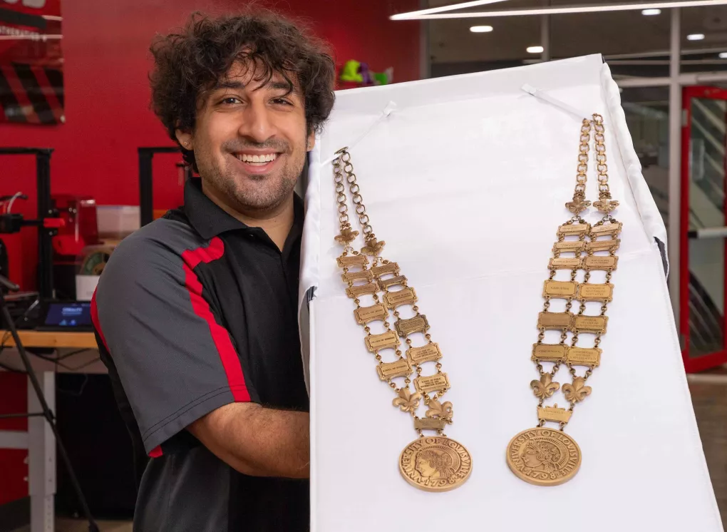 Luis Rodriguez 3D printed a lighter weight replica of the metal medallion necklace worn by UofL's president in commencement and other ceremonies.