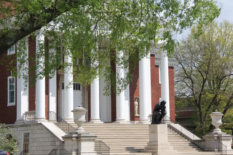 Steps to Grawemeyer Hall with the Thinker