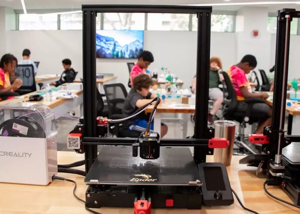 Students working in a 3D printer lab