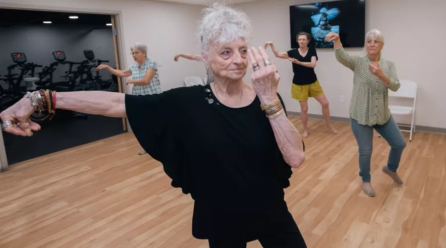 Senior adult woman doing Tai Chi